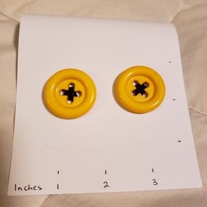 Retro yellow button earrings.